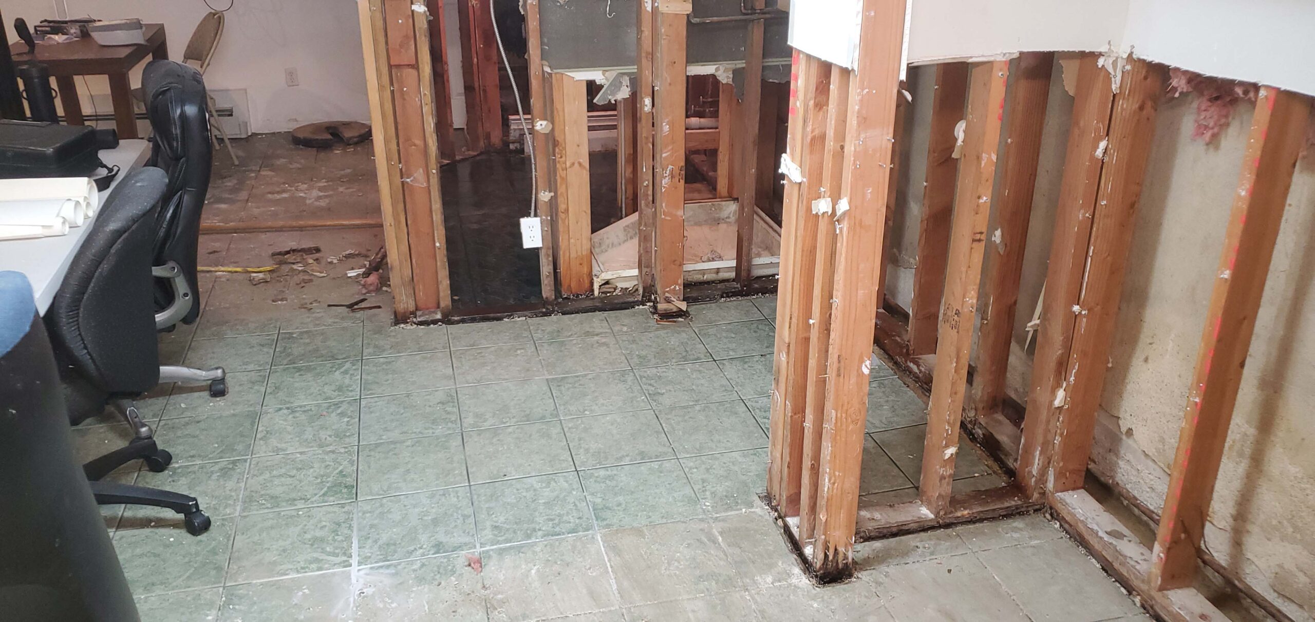 water damage to basement floor flushing ny